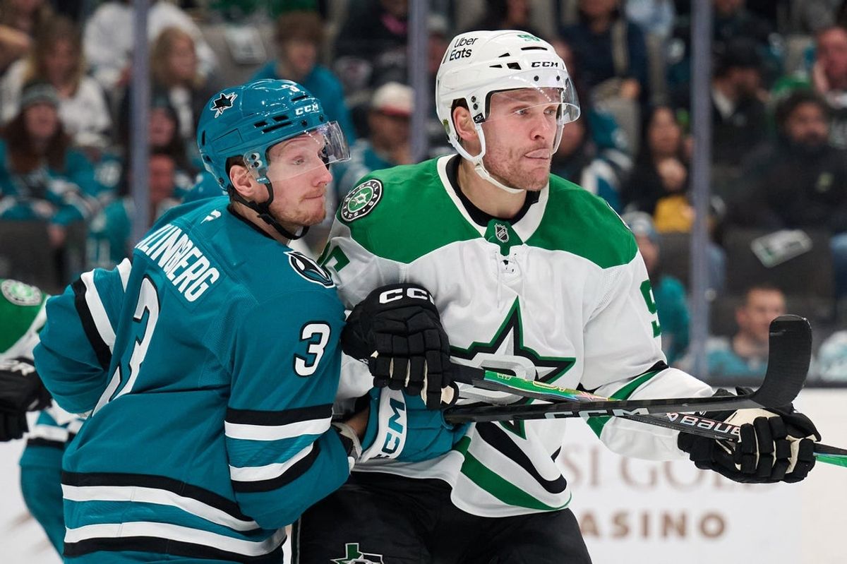 Dec 18, 2025; San Jose, California, USA;  Dallas Stars right wing Mikko Rantanen (96) vies for position against San Jose Sharks defenseman John Klingberg (3) during the first period at SAP Center at San Jose. Mandatory Credit: Robert Edwards-Imagn Images