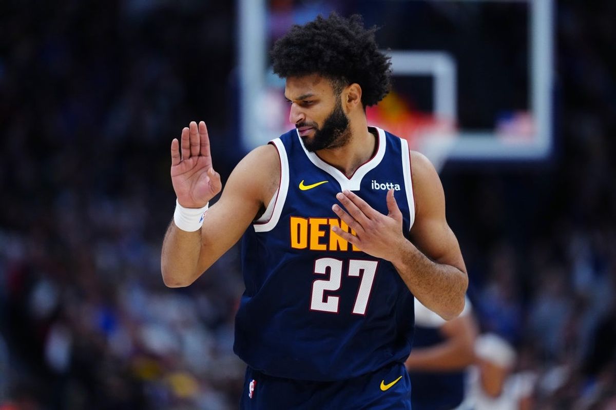 Dec 18, 2025; Denver, Colorado, USA; Denver Nuggets guard Jamal Murray (27) reacts during the second half against the Orlando Magic at Ball Arena. Mandatory Credit: Ron Chenoy-Imagn Images