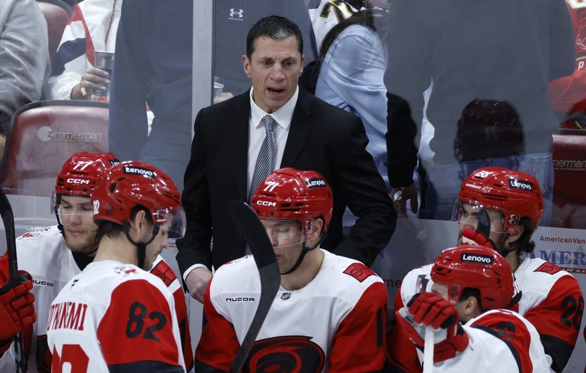Dec 19, 2025; Sunrise, Florida, USA;  Carolina Panthers head coach Rod Brind'Amour talks to his team during a time out against the Florida Panthers during the first period at Amerant Bank Arena. Mandatory Credit: Rhona Wise-Imagn Images