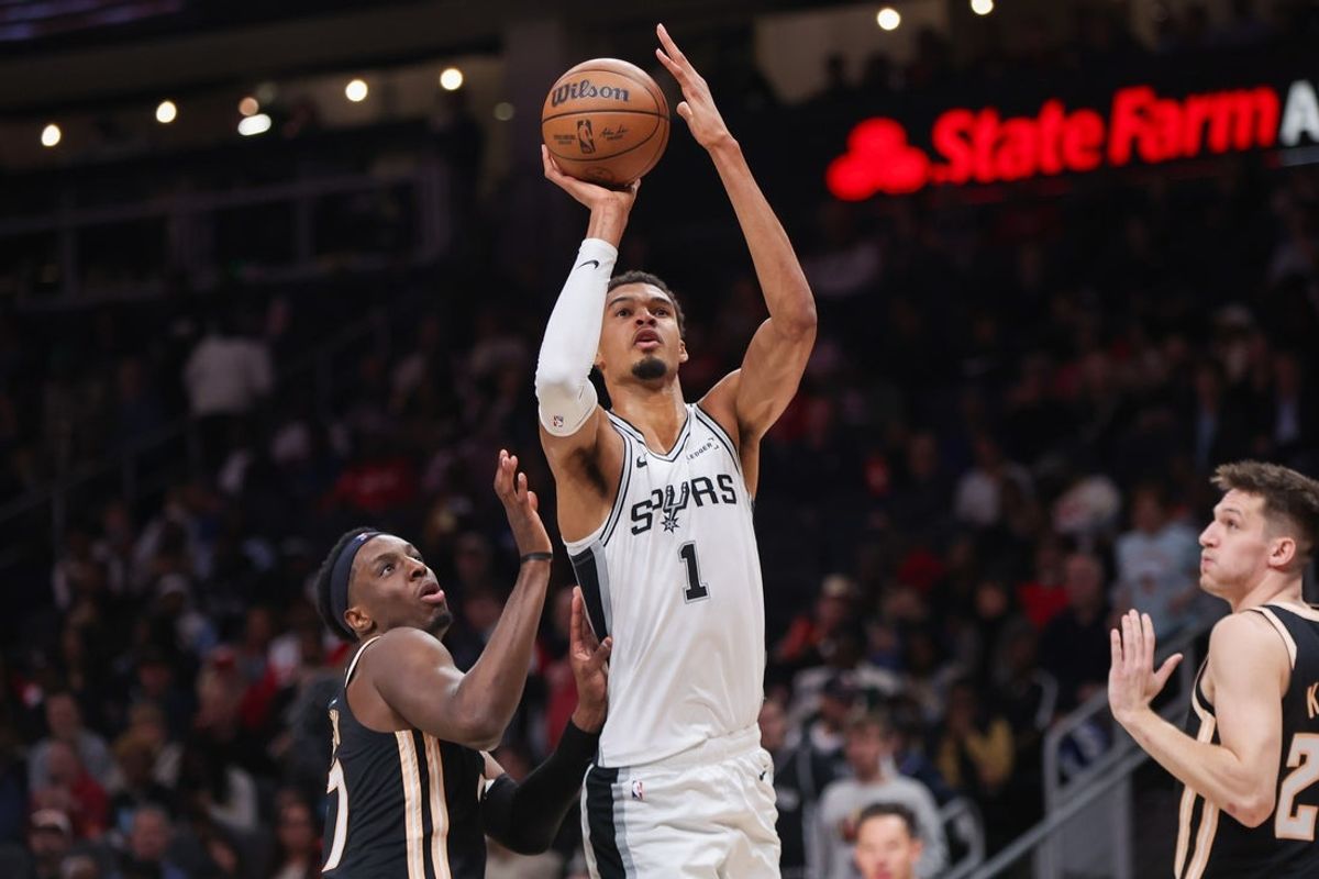 Dec 19, 2025; Atlanta, Georgia, USA; San Antonio Spurs forward Victor Wembanyama (1) shoots against the Atlanta Hawks in the second quarter at State Farm Arena. Mandatory Credit: Brett Davis-Imagn Images