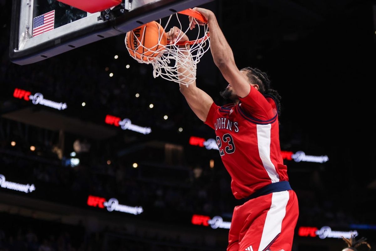 Dec 20, 2025; Atlanta, Georgia, USA; St. John Red Storm forward Bryce Hopkins (23) dunks against the Kentucky Wildcats in the second half at State Farm Arena. Mandatory Credit: Brett Davis-Imagn Images