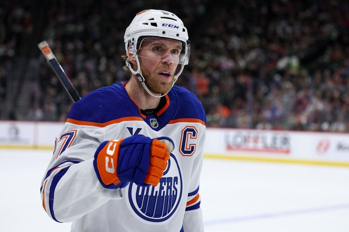 Dec 20, 2025; Saint Paul, Minnesota, USA; Edmonton Oilers center Connor McDavid (97) celebrates his goal against the Minnesota Wild during the first period at Grand Casino Arena. Mandatory Credit: Matt Krohn-Imagn Images