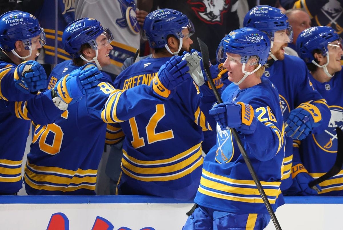 Dec 20, 2025; Buffalo, New York, USA;  Buffalo Sabres defenseman Rasmus Dahlin (26) celebrates his goal with teammates during the first period against the New York Islanders at KeyBank Center. Mandatory Credit: Timothy T. Ludwig-Imagn Images