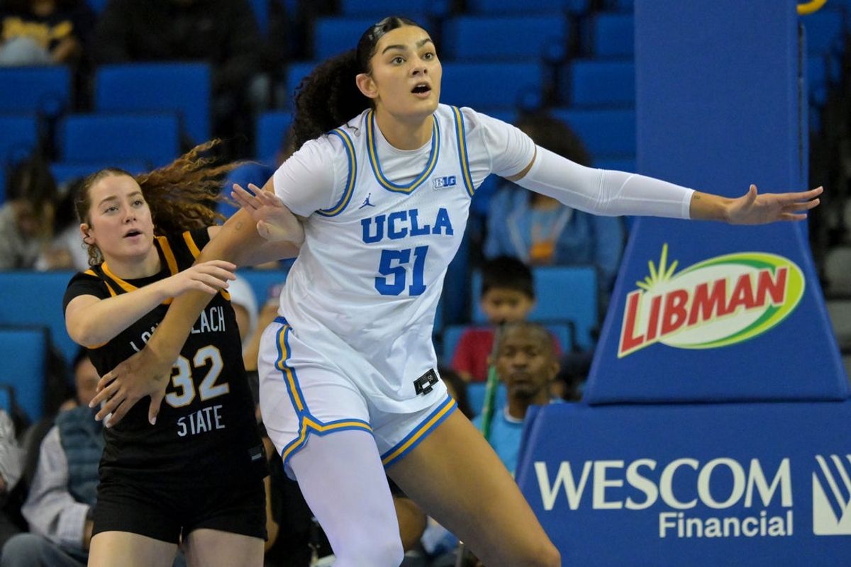 Dec 20, 2025; Los Angeles, California, USA; UCLA Bruins center Lauren Betts (51) boxes out Long Beach State Beach guard Brynna Pukis (32) under the basket during the second half at Pauley Pavilion presented by Wescom Financial. Mandatory Credit: Jayne Kamin-Oncea-Imagn Images