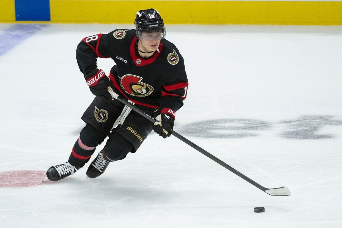 Dec 20, 2025; Ottawa, Ontario, CAN; Ottawa Senators center Tim Stutzle (18) controls the puck in the third period against Chicago Blackhawks at the Canadian Tire Centre. Mandatory Credit: Marc DesRosiers-IMAGN Images