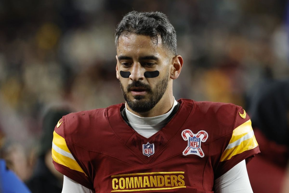 Dec 20, 2025; Landover, Maryland, USA; Washington Commanders quarterback Marcus Mariota (8) walks to the medical tent during the second half against the Philadelphia Eagles at Northwest Stadium. Mandatory Credit: Amber Searls-Imagn Images