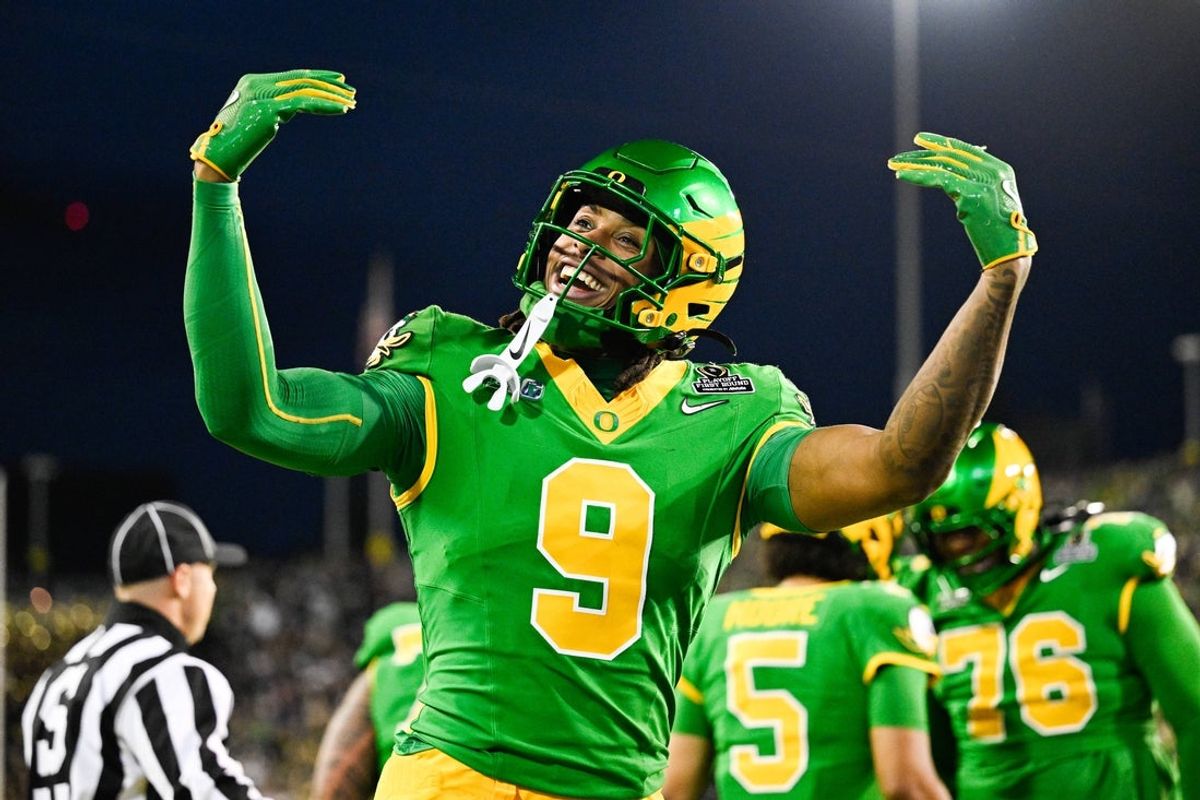 Dec 20, 2025; Eugene, OR, USA;  Oregon Ducks tight end Jamari Johnson (9) celebrates after a touchdown from Oregon Ducks quarterback Dante Moore (not pictured) during the first quarter against the James Madison Dukes at Autzen Stadium. Mandatory Credit: Troy Wayrynen-Imagn Images