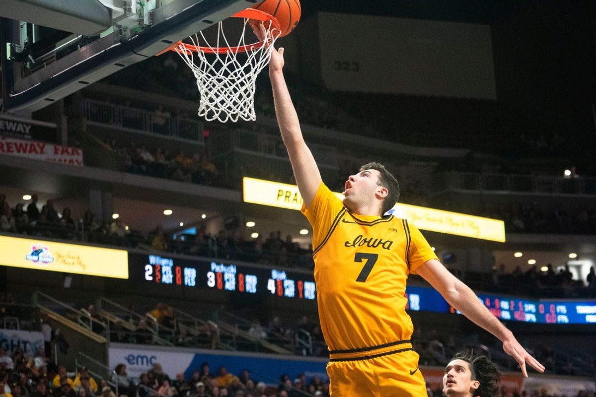 Iowa's Alvaro Folgueiras attempts a basket during a game at Casey's Center on Saturday, Dec. 20, 2025 in Des Moines.