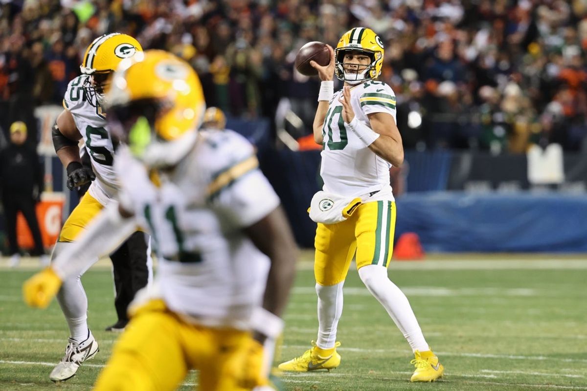 Dec 20, 2025; Chicago, Illinois, USA; Green Bay Packers quarterback Jordan Love (10) throws a pass against the Chicago Bears during the first quarter at Soldier Field. Mandatory Credit: Mike Dinovo-Imagn Images