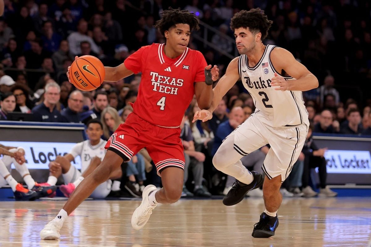Dec 20, 2025; New York, New York, USA; Texas Tech Red Raiders guard Christian Anderson (4) controls the ball against Duke Blue Devils guard Cayden Boozer (2) during the second half at Madison Square Garden. Mandatory Credit: Brad Penner-Imagn Images