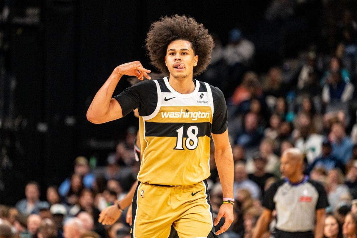 Dec 20, 2025; Memphis, Tennessee, USA; Washington Wizards Forward Kyshawn George (18) celebrates after hitting a three point shot in the third quarter against the Memphis Grizzlies at FedExForum. Mandatory Credit: Matthew Smith-Imagn Images