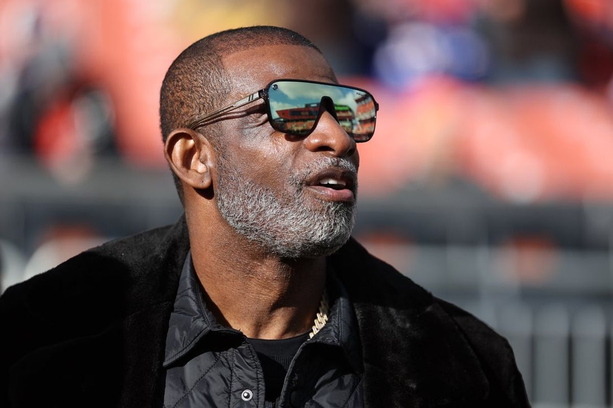 Dec 21, 2025; Cleveland, Ohio, USA;  Legendary  football and baseball player and father of Cleveland Browns quarterback Shedeur Sanders, Deion Sanders on the sidelines prior to a game against the Buffalo Bills at Huntington Bank Field. Mandatory Credit: Scott Galvin-Imagn Images