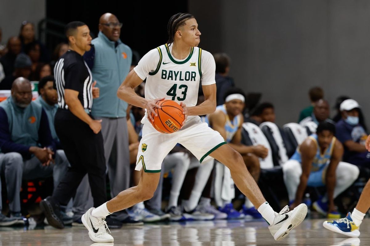 Dec 21, 2025; Waco, Texas, USA; Baylor Bears guard Cameron Carr (43) looks to pass against the Southern University Jaguars during the first half at Paul and Alejandra Foster Pavilion. Mandatory Credit: Chris Jones-Imagn Images