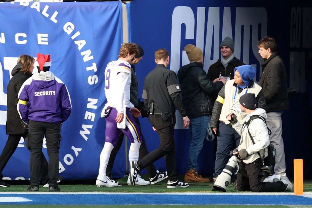 Dec 21, 2025; East Rutherford, New Jersey, USA; Minnesota Vikings quarterback J.J. McCarthy (9) is taken to the locker room after a hit against the New York Giants during the first half at MetLife Stadium. Mandatory Credit: Vincent Carchietta-Imagn Images
