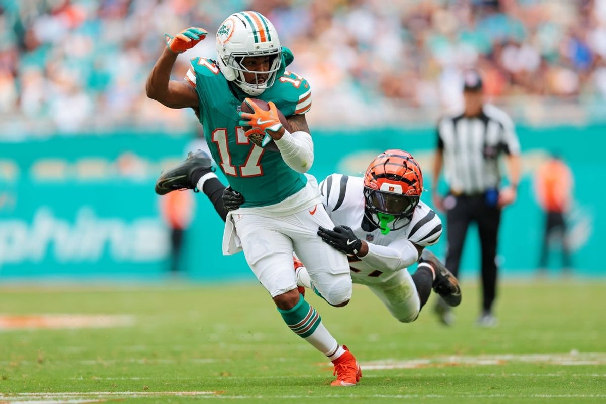 Dec 21, 2025; Miami Gardens, Florida, USA; Miami Dolphins wide receiver Jaylen Waddle (17) runs the ball during the second quarter against the Cincinnati Bengals at Hard Rock Stadium. Mandatory Credit: Sam Navarro-Imagn Images
