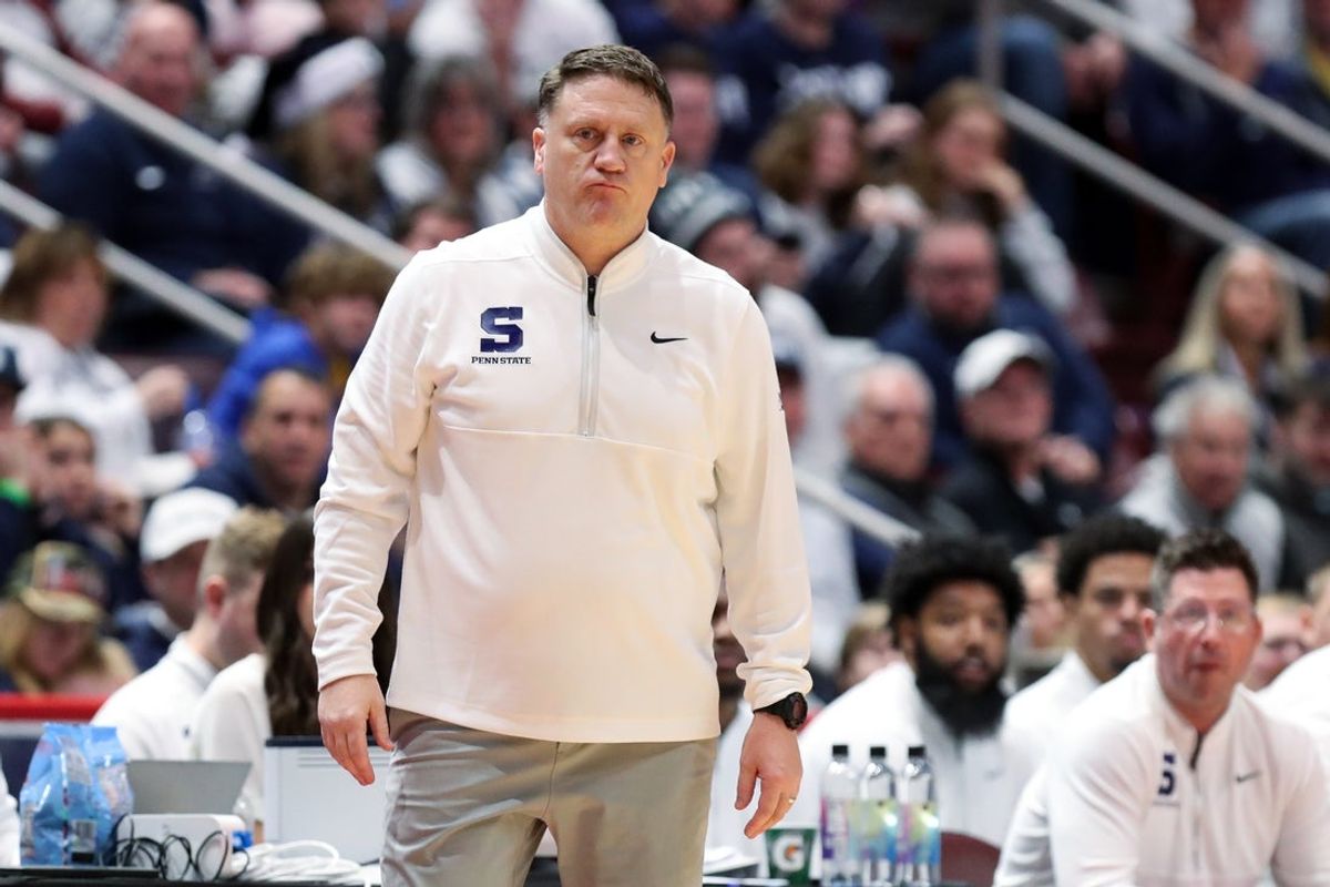 Dec 21, 2025; Hershey, Pennsylvania, USA; Penn State Nittany Lions head coach Mike Rhoades looks on from the bench during the second half against the Pittsburg Panthers at Giant Center. Mandatory Credit: Matthew O'Haren-Imagn Images