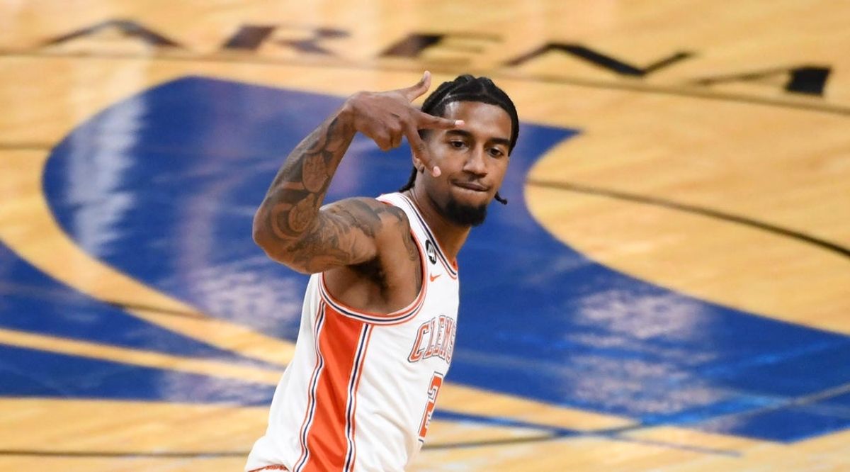 Clemson Tigers guard Dillon Hunter (2) reacts after scoring Sunday, Dec. 21, 2025, during the NCAA men’s basketball game against the Cincinnati Bearcats at Bon Secours Wellness Arena in Greenville, South Carolina.