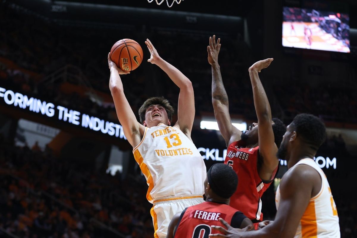 Dec 21, 2025; Knoxville, Tennessee, USA; Tennessee Volunteers forward J.P. Estrella (13) shoots the ball against the Gardner-Webb Runnin' Bulldogs during the first half at Thompson-Boling Arena at Food City Center. Mandatory Credit: Randy Sartin-Imagn Images