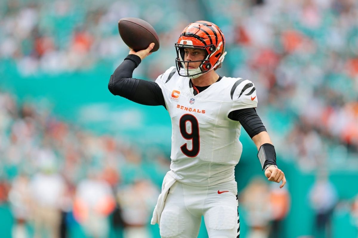 Dec 21, 2025; Miami Gardens, Florida, USA; Cincinnati Bengals quarterback Joe Burrow (9) looks to make a pass during the third quarter against the Cincinnati Bengals at Hard Rock Stadium. Mandatory Credit: Sam Navarro-Imagn Images