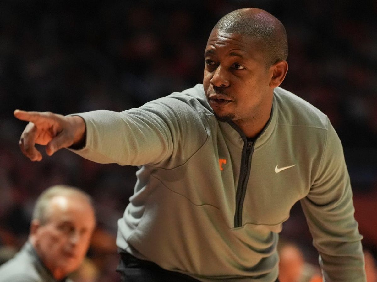 Tennessee associate basketball coach Justin Gainey tells players to sub in during an NCAA college basketball game against Gardner-Webb on Dec. 21, 2025, in Knoxville, Tennessee.