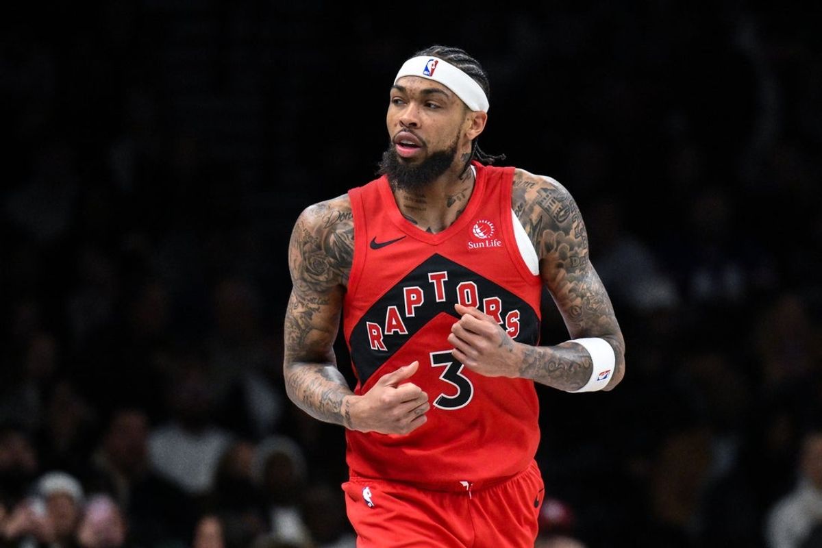Dec 21, 2025; Brooklyn, New York, USA; Toronto Raptors forward Brandon Ingram (3) reacts after making a shot against the Brooklyn Nets during the first half at Barclays Center. Mandatory Credit: John Jones-Imagn Images