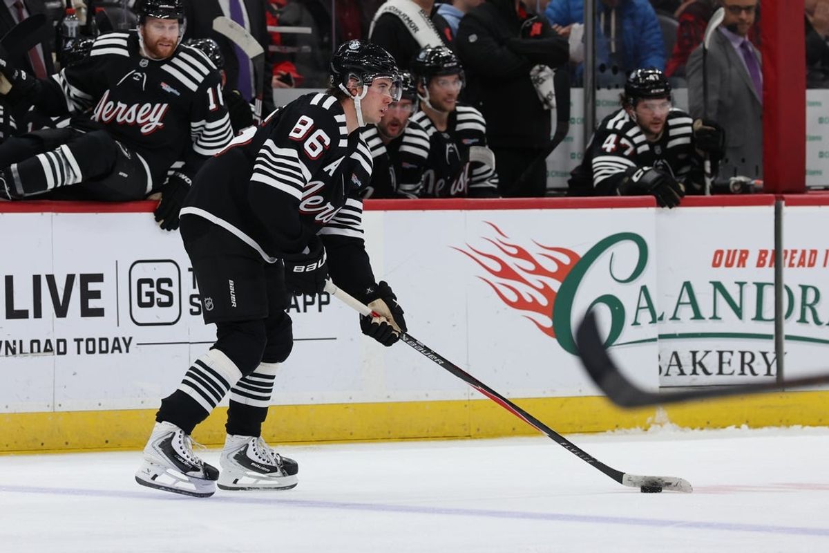 Dec 21, 2025; Newark, New Jersey, USA;   New Jersey Devils center Jack Hughes (86) controls the puck against the Buffalo Sabres during the third period at Prudential Center. Mandatory Credit: Thomas Salus-Imagn Images