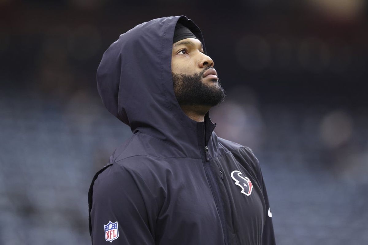 Dec 21, 2025; Houston, Texas, USA; Houston Texans wide receiver Nico Collins (12) warms up before the game against the Las Vegas Raiders at NRG Stadium. Mandatory Credit: Troy Taormina-Imagn Images