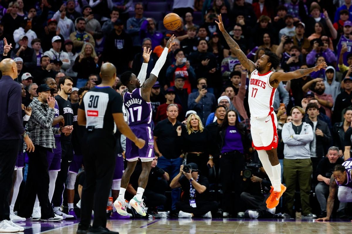 Dec 21, 2025; Sacramento, California, USA; Sacramento Kings guard Dennis Schroder (17) scores a basket in overtime against the Houston Rockets at Golden 1 Center. Mandatory Credit: Sergio Estrada-Imagn Images