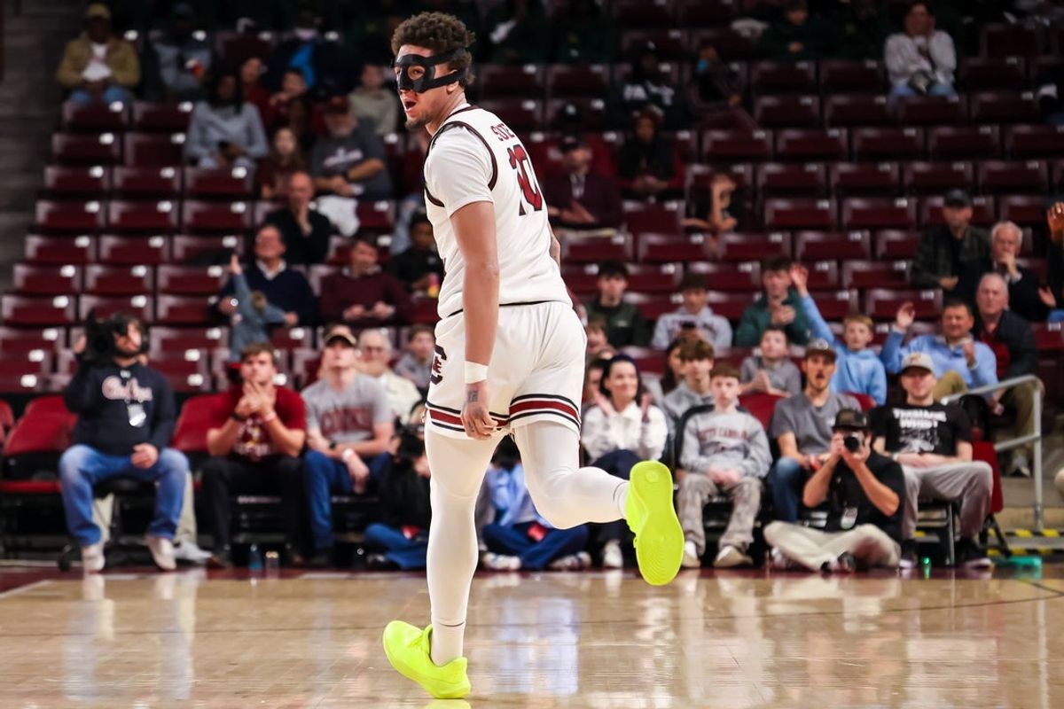 Dec 22, 2025; Columbia, South Carolina, USA; South Carolina Gamecocks forward Myles Stute (10) celebrates a three point basket against the South Carolina State Bulldogs in the first half at Colonial Life Arena. Mandatory Credit: Jeff Blake-Imagn Images