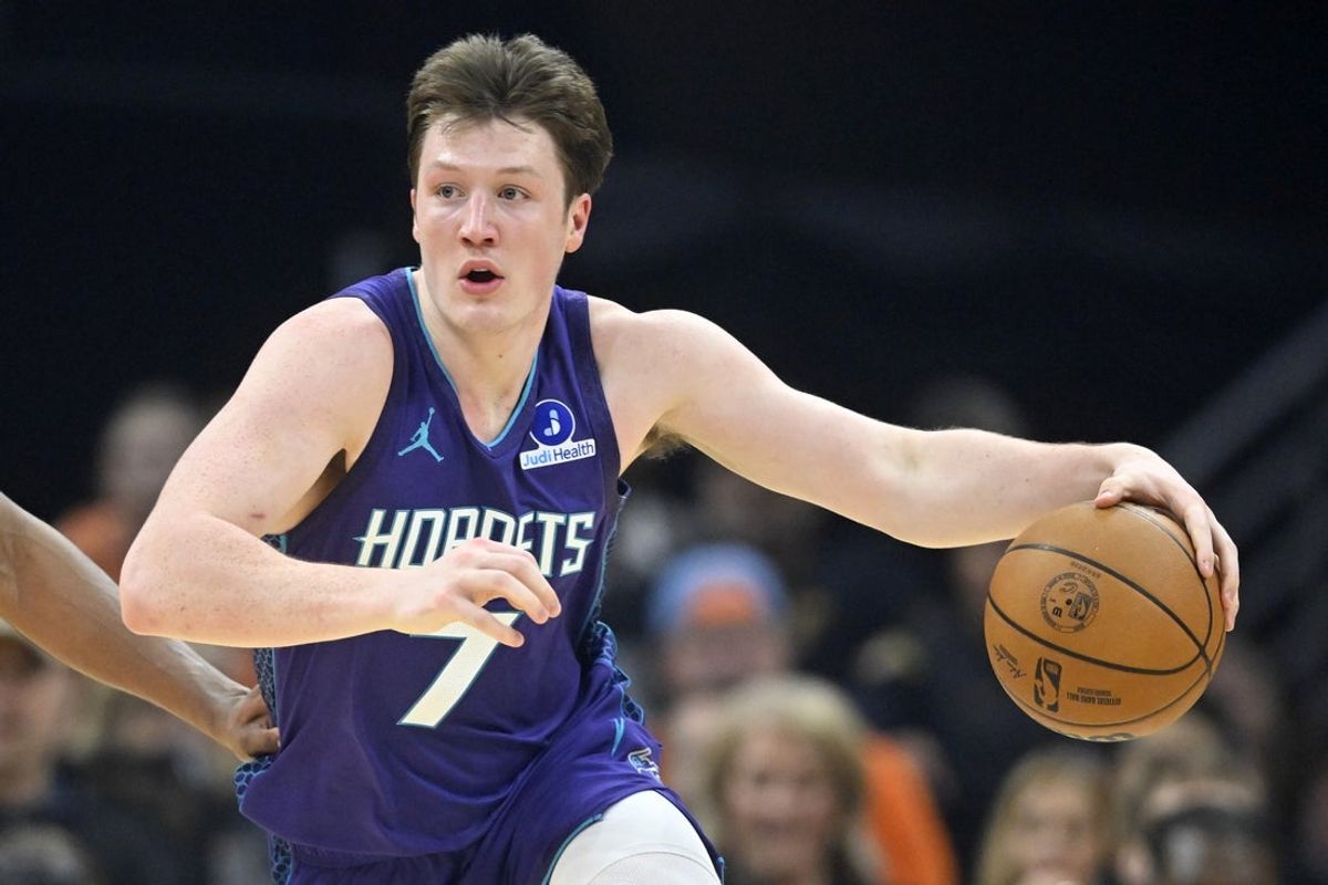 Dec 22, 2025; Cleveland, Ohio, USA; Charlotte Hornets guard Kon Knueppel (7) dribbles the ball in the first quarter against the Cleveland Cavaliers at Rocket Arena. Mandatory Credit: David Richard-Imagn Images