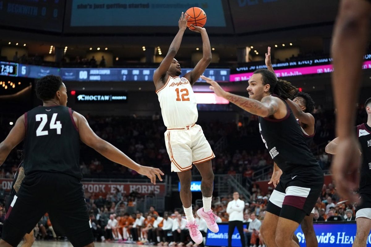 Dec 22, 2025; Austin, Texas, USA; Texas Longhorns guard Tramon Mark (12) shoots the ball against the Maryland Eastern Shore Hawks during the first half at Moody Center. Mandatory Credit: Dustin Safranek-Imagn Images