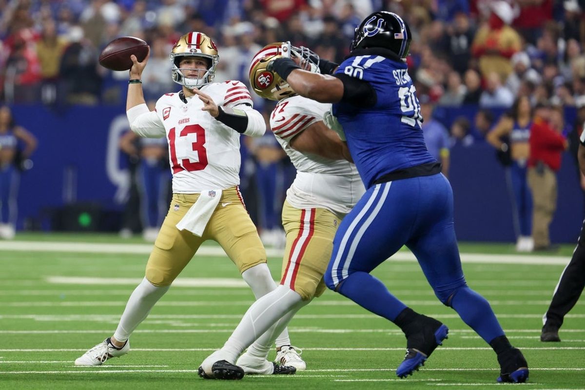 Dec 22, 2025; Indianapolis, Indiana, USA; San Francisco 49ers quarterback Brock Purdy (13) passes the ball against the Indianapolis Colts in the first quarter of the game at Lucas Oil Stadium. Mandatory Credit: Trevor Ruszkowski-Imagn Images