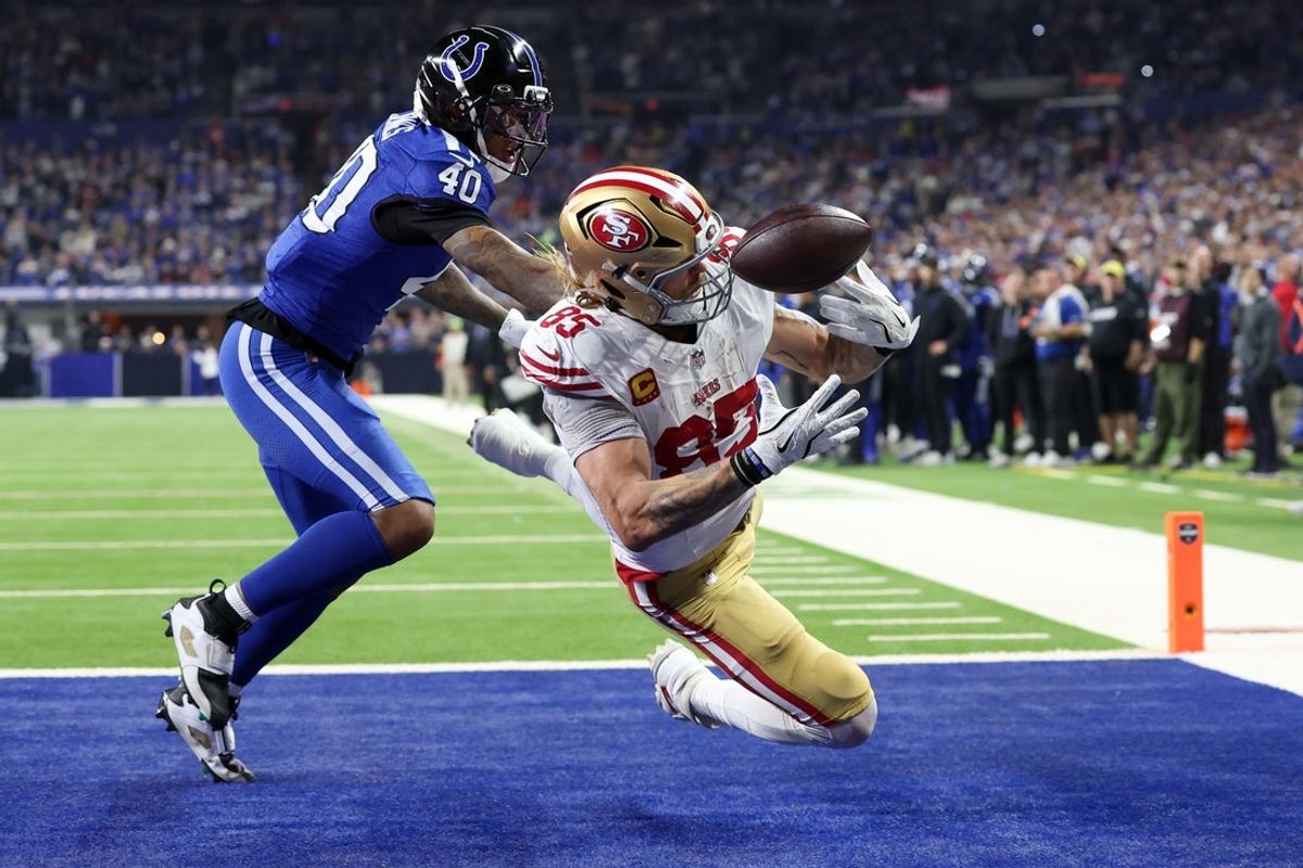 Dec 22, 2025; Indianapolis, Indiana, USA; San Francisco 49ers tight end George Kittle (85) is unable to make a catch for a touchdown defended by Indianapolis Colts cornerback Jaylon Jones (40) in the second quarter of the game at Lucas Oil Stadium. Mandatory Credit: Trevor Ruszkowski-Imagn Images