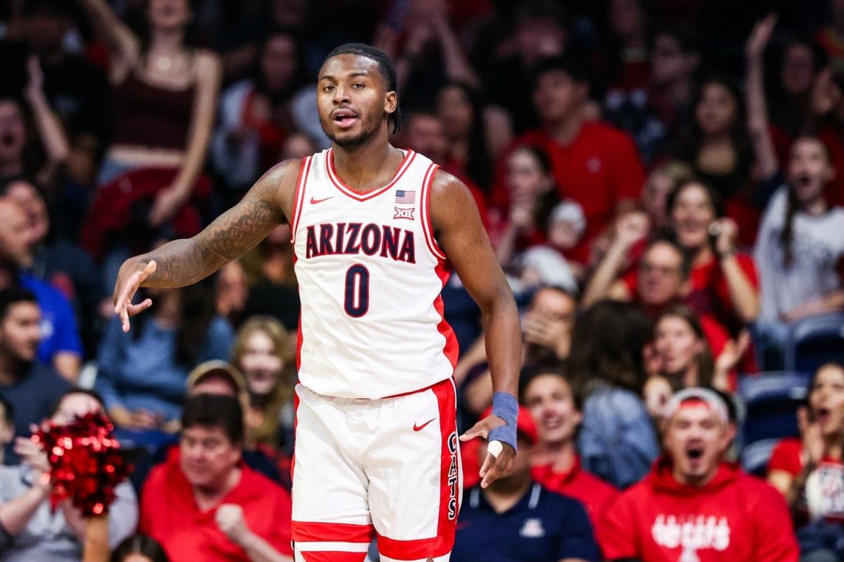 Dec 22, 2025; Tucson, Arizona, USA; Arizona Wildcats guard Jaden Bradley (0) makes a three pointer during the first half of the game against the Bethune-Cookman Wildcats at McKale Memorial Center. Mandatory Credit: Aryanna Frank-Imagn Images