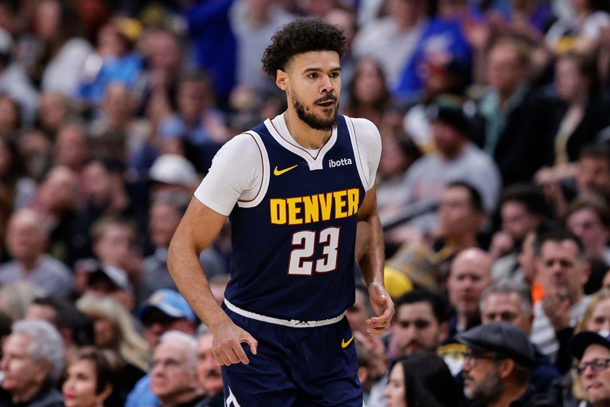 Dec 22, 2025; Denver, Colorado, USA; Denver Nuggets forward Cameron Johnson (23) in the second quarter against the Utah Jazz at Ball Arena. Mandatory Credit: Isaiah J. Downing-Imagn Images