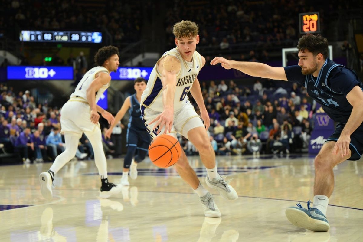 Dec 22, 2025; Seattle, Washington, USA; Washington Huskies forward Hannes Steinbach (6) steals the ball during the second half against the San Diego Toreros at Alaska Airlines Arena at Hec Edmundson Pavilion. Mandatory Credit: Steven Bisig-Imagn Images