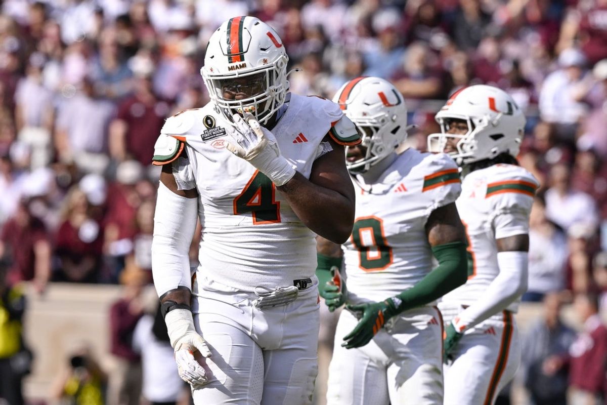 Miami Hurricanes defensive lineman Rueben Bain Jr. (4) looks on during the game between the Aggies and the Hurricanes at Kyle Field. Mandatory Credit: Jerome Miron-Imagn Images