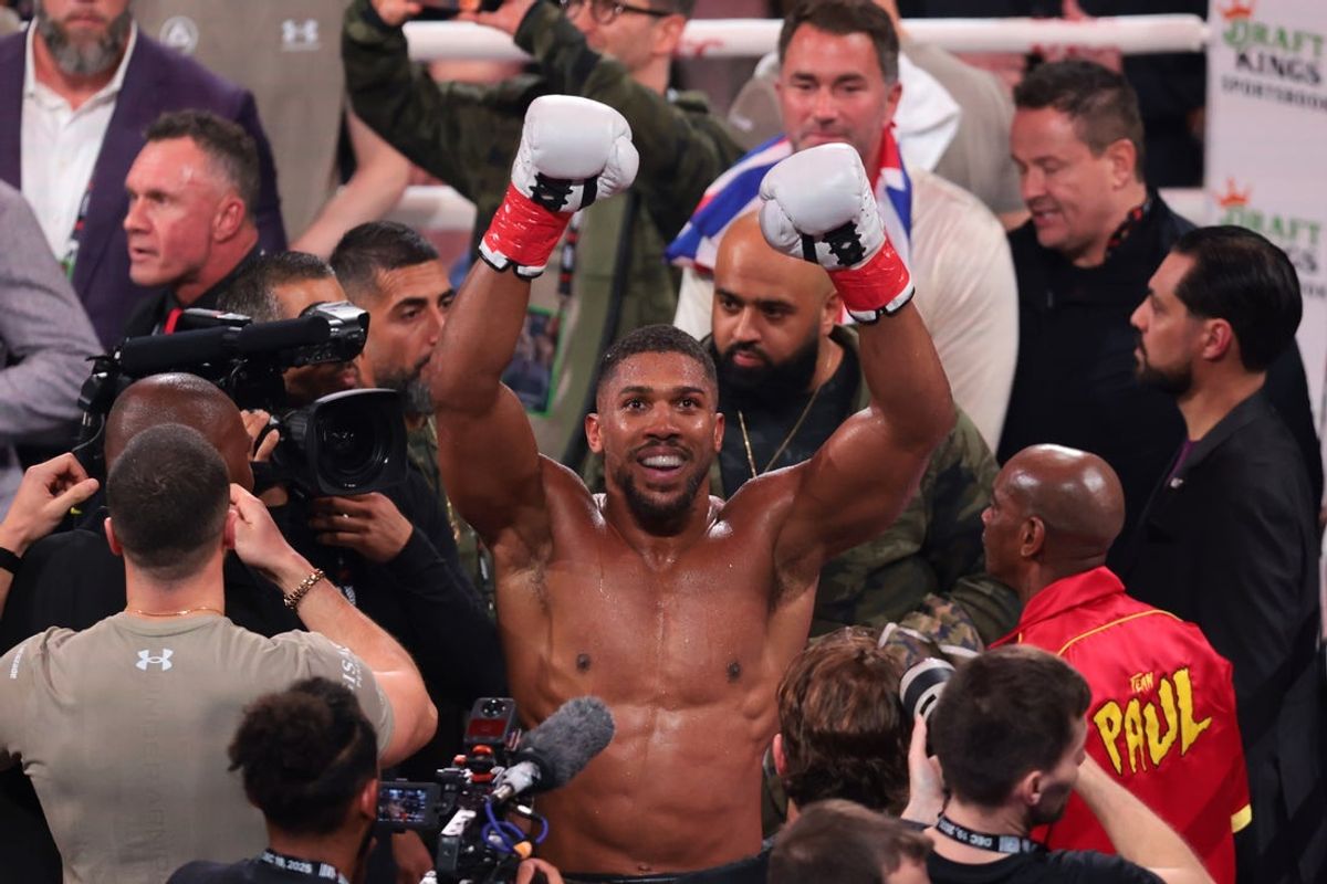 Dec 19, 2025; Miami, Florida, UNITED STATES; Anthony Joshua celebrates after defeating Jake Paul during a heavyweight boxing bout at Kaseya Center. Mandatory Credit: Sam Navarro-Imagn Images