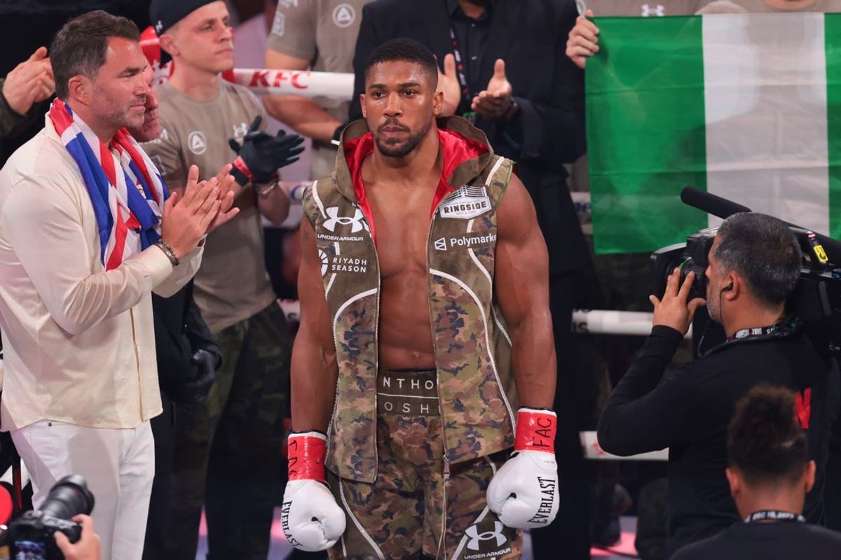 Dec 19, 2025; Miami, Florida, UNITED STATES; Anthony Joshua looks on from the ring before his during a heavyweight boxing bout against Jake Paul at Kaseya Center. Mandatory Credit: Sam Navarro-Imagn Images