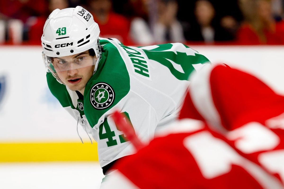 Dec 23, 2025; Detroit, Michigan, USA;  Dallas Stars center Justin Hryckowian (49) gets set during a face off in the first period against the Detroit Red Wings at Little Caesars Arena. Mandatory Credit: Rick Osentoski-Imagn Images