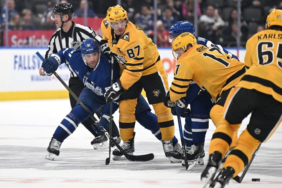 Dec 23, 2025; Toronto, Ontario, CAN;  Pittsburgh Penguins forward Sidney Crosby (87) wins a faceoff against Toronto Maple Leafs forward John Tavares (91) in the third period at Scotiabank Arena. Mandatory Credit: Dan Hamilton-Imagn Images