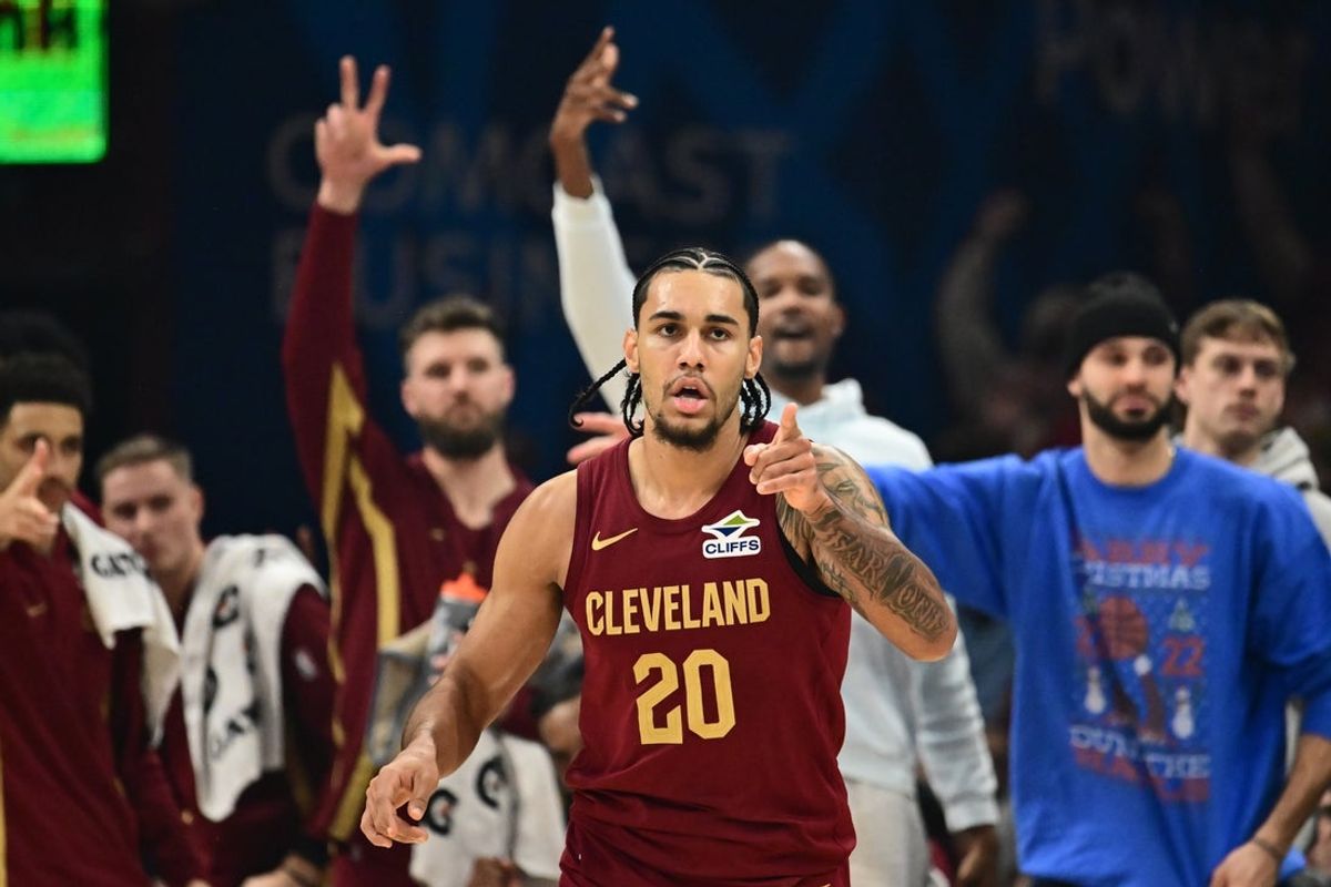 Dec 23, 2025; Cleveland, Ohio, USA; Cleveland Cavaliers guard Jaylon Tyson (20) celebrates after hitting a three point basket against the New Orleans Pelicans during the first half at Rocket Arena. Mandatory Credit: Ken Blaze-Imagn Images