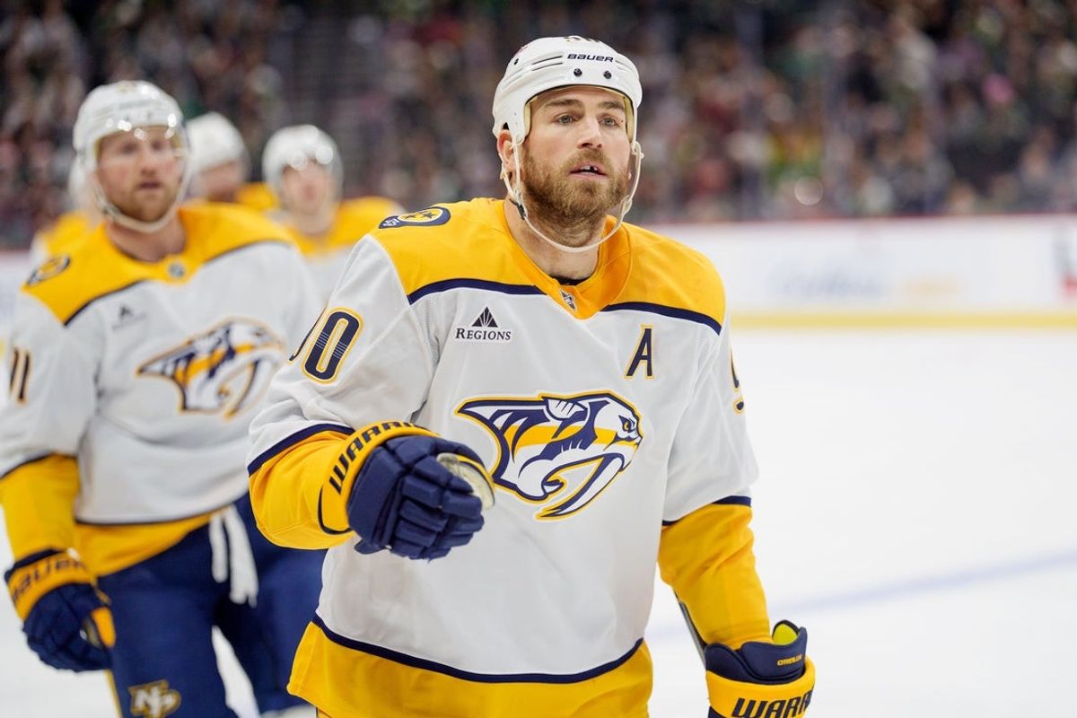 Dec 23, 2025; Saint Paul, Minnesota, USA; Nashville Predators center Ryan O'Reilly (90) leads the team to the bench after scoring against the Minnesota Wild in the first period at Grand Casino Arena. Mandatory Credit: Matt Blewett-Imagn Images