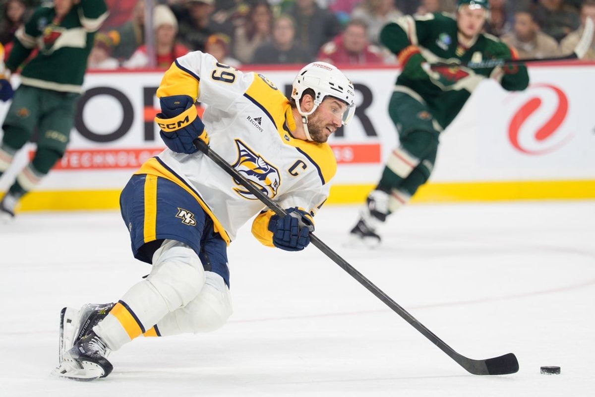 Dec 23, 2025; Saint Paul, Minnesota, USA; Nashville Predators defenseman Roman Josi (59) intercepts a Minnesota Wild pass in the second period at Grand Casino Arena. Mandatory Credit: Matt Blewett-Imagn Images