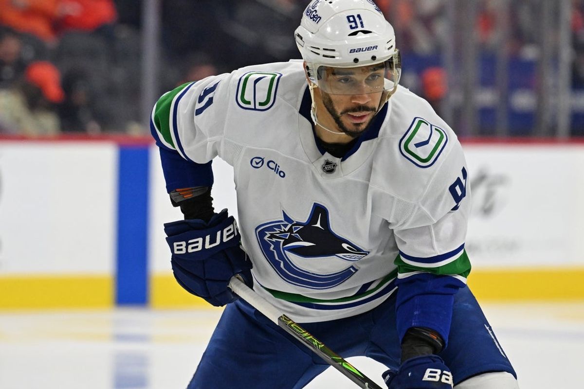 Dec 22, 2025; Philadelphia, Pennsylvania, USA; Vancouver Canucks left wing Evander Kane (91) against the Philadelphia Flyers at Xfinity Mobile Arena. Mandatory Credit: Eric Hartline-Imagn Images