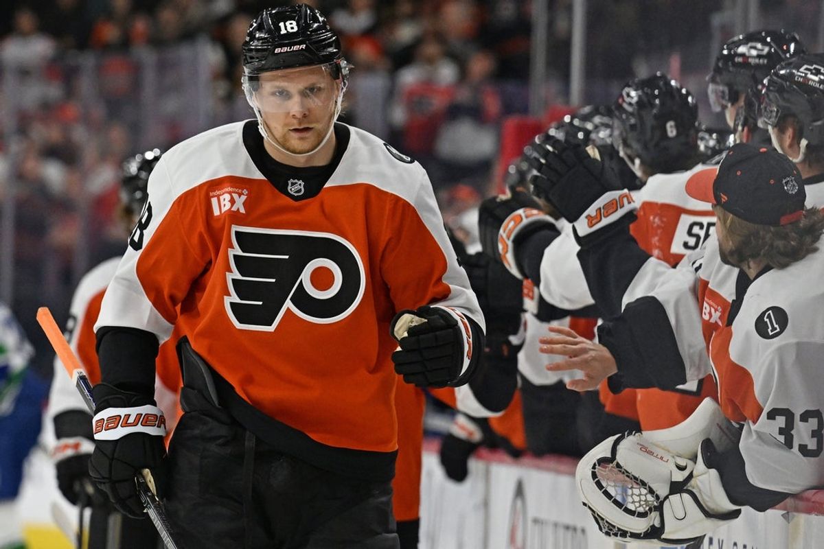 Dec 22, 2025; Philadelphia, Pennsylvania, USA; Philadelphia Flyers center Rodrigo Abols (18) against the Vancouver Canucks at Xfinity Mobile Arena. Mandatory Credit: Eric Hartline-Imagn Images