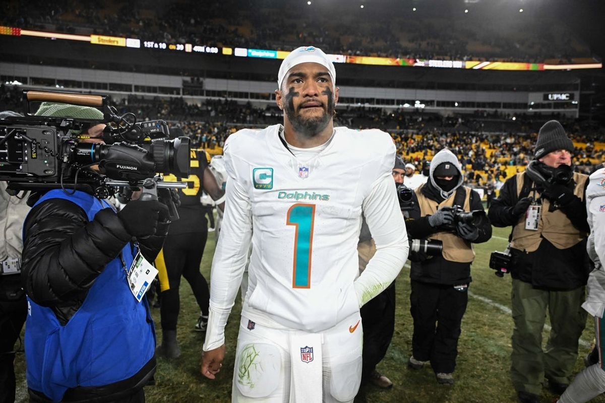 Dec 15, 2025; Pittsburgh, Pennsylvania, USA; Miami Dolphins quarterback Tua Tagovailoa (1) leaves the  field following a game against the Pittsburgh Steelers at Acrisure Stadium. Mandatory Credit: Barry Reeger-Imagn Images