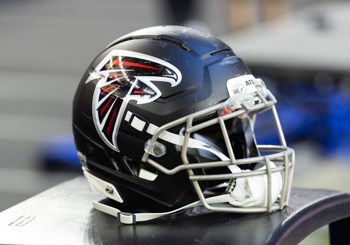 Dec 21, 2025; Glendale, Arizona, USA; Detailed view of an Atlanta Falcons helmet at State Farm Stadium. Mandatory Credit: Mark J. Rebilas-Imagn Images