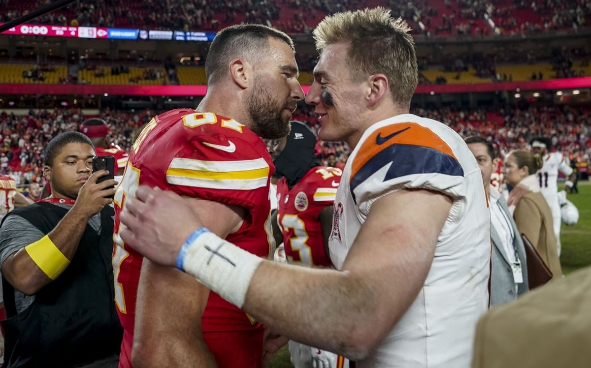 Dec 25, 2025; Kansas City, Missouri, USA; Denver Broncos quarterback Bo Nix (10) and Kansas City Chiefs tight end Travis Kelce (87) after the game at GEHA Field at Arrowhead Stadium. Mandatory Credit: Denny Medley-Imagn Images