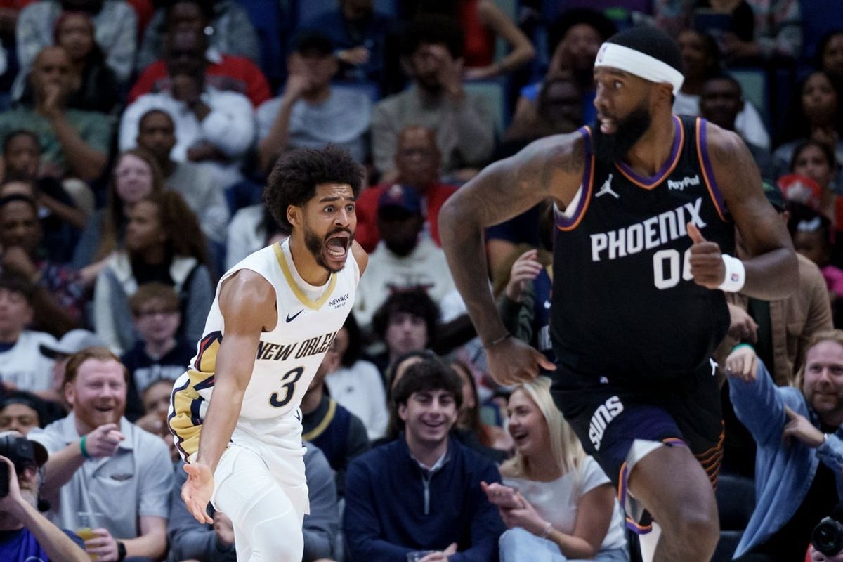 Dec 26, 2025; New Orleans, Louisiana, USA; New Orleans Pelicans guard Jordan Poole (3) reacts after a no foul call against Phoenix Suns forward Royce O'Neale (00) during the first half at Smoothie King Center. Mandatory Credit: Matthew Hinton-Imagn Images